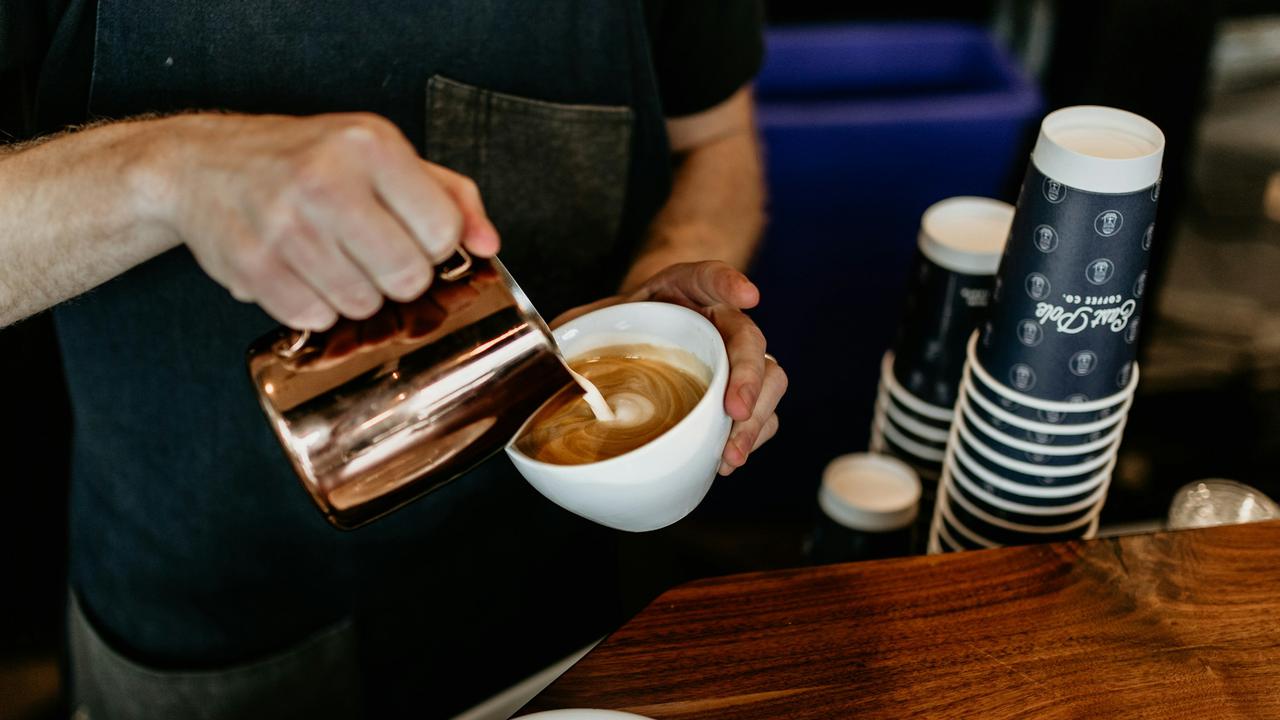 Barista pouring a latte art